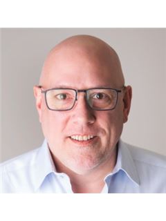 Associate - Peter J. Klebenow - RE/MAX Advantage Realty