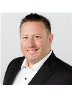 Michael A. Blauer - RE/MAX Realty Group