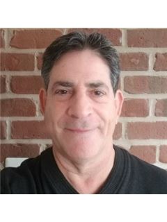 Miguel F. Ruiz - RE/MAX Realty Services