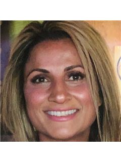 Atusa Haynes - RE/MAX Distinctive
