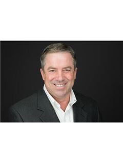 Lawrence M. Evans - RE/MAX Realty Group