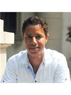 Barrett C. Evans - RE/MAX Realty Services