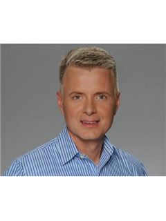 Robert L. Moran - RE/MAX Central Realty
