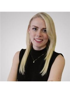 Kelsey Lee Hyman - RE/MAX Southland Realty II