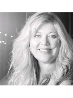 Carey Clamens - RE/MAX Island Realty