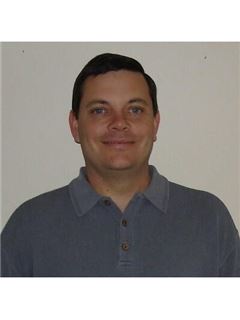 John W. Gatlin - RE/MAX Central Realty