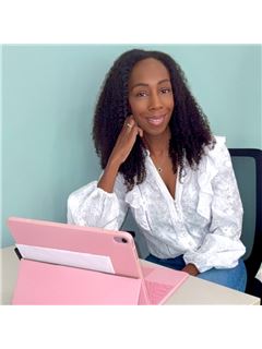 Tia Caywood - RE/MAX Summit