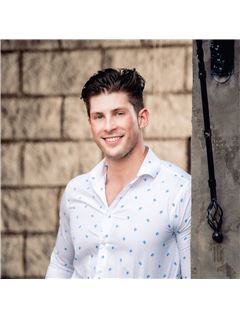 Logan Millard - RE/MAX United
