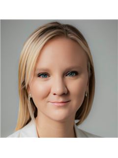 Cassie McBroom - RE/MAX Experts