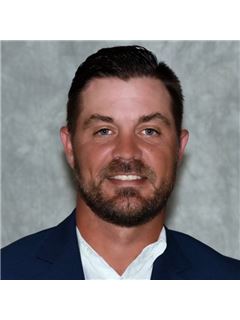 Robert R. Schroeder - RE/MAX Champions