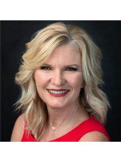 Kelly L. Butterfield - RE/MAX Town & Country Realty