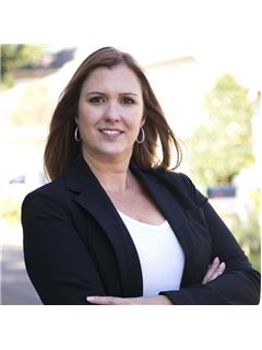 Carina Barber - RE/MAX Realty Unlimited