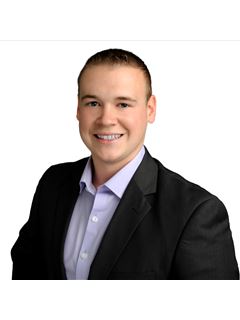 Tyler Stopowenko - RE/MAX Realty Unlimited