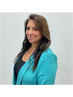 Laura E. Sanders - RE/MAX Direct
