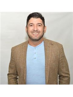 Phillip Delgado - RE/MAX Advance Realty II