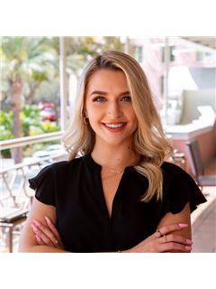 Kaley Clopton - RE/MAX Realty Unlimited