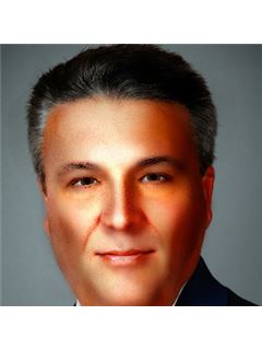 Curtis Carter - RE/MAX Specialists