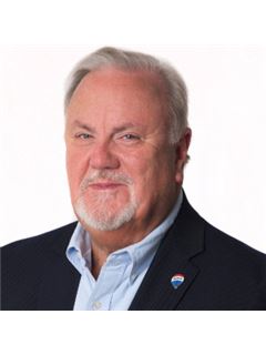 Associate - Gerald F. Smith - RE/MAX Specialists