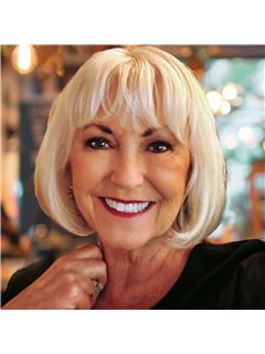 Janie A. Nelson - RE/MAX Trend