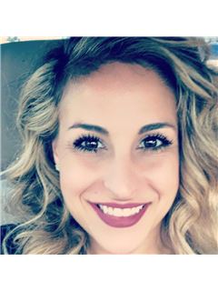 Ashley Albertson - RE/MAX Realtec Group