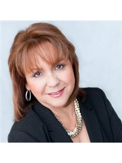 Mary Yvette Nieves - RE/MAX Realty Unlimited