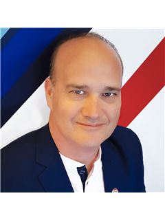 Bryan Reith - RE/MAX Realty Unlimited