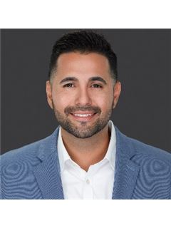 Carlos A. Caicedo - RE/MAX Direct