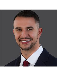 Trevor Skeens - RE/MAX Realty Unlimited