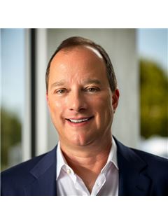Brett Adams - RE/MAX Advance Realty II
