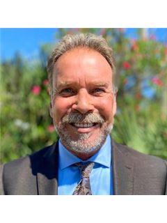 Curtis Palmer - RE/MAX Action First