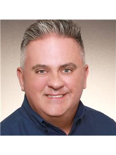 Greg F. Mosley - RE/MAX Specialists