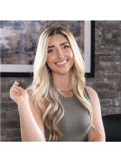 Ashley Carapella - RE/MAX Revolution