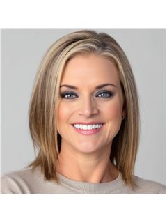 Jackie Fogg - RE/MAX Revolution