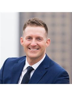 Tyler J. Coon - RE/MAX Concepts