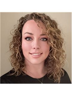 Brittany Giefer - RE/MAX Revolution