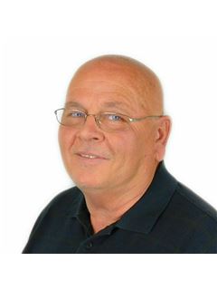 Ernie Huffey - RE/MAX Revolution