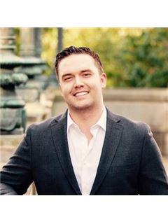 Adam D. Hert - RE/MAX Parkside Affiliates