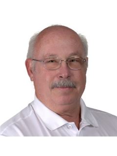 Ken C. Swisher - RE/MAX Country Real Estate
