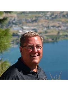 Właściciel biura - Chris Millsap - RE/MAX Advantage