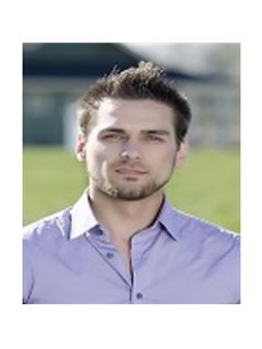 Spencer J. Davis - RE/MAX Capital City