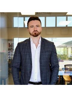 Ernest Smajlaj - RE/MAX Town & Country