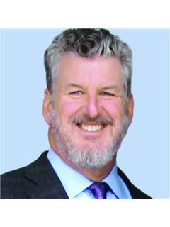 Andrew J. Burke - RE/MAX Realty Group