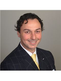 Nicholas E. Perlet - RE/MAX Realty Group
