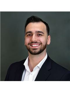 Logan Kader - RE/MAX Solutions