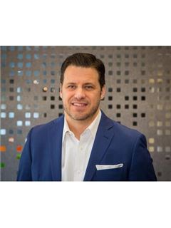 Cory Johnson - RE/MAX Classic Realty