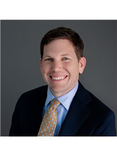 Directeur d'agence - Tim Moldenhauer - RE/MAX Associates