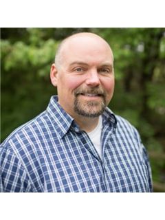 John Rhodes - RE/MAX Associates