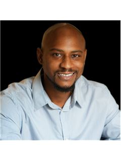 Audie Jordan - RE/MAX Universal