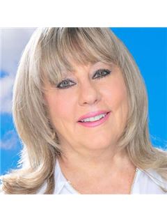 Tracie Romel - RE/MAX Professionals