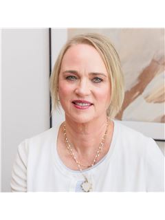 Jerri B. Comer - RE/MAX Signature